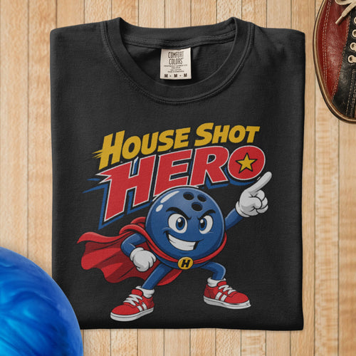A black crewneck t-shirt featuring a cartoon graphic of a blue bowling ball superhero and the text House Shot Hero.